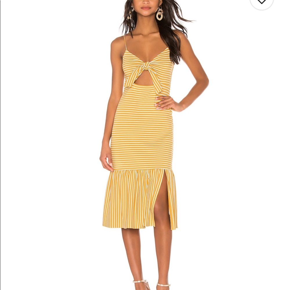 Saylor Dorris dress in Mustard size medium